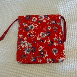 Miu Miu red floral pouch bag. Includes certificate of authenticity.